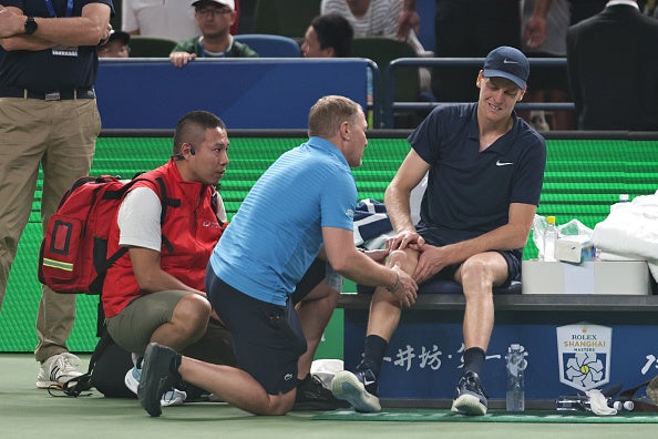 Jannik Sinner of Italy withdraws due to injury during the match against Tallon Griekspoor of Netherlands in the men's singles 3rd round match on day 7 of the 2025 Shanghai Rolex Masters Qi Zhong Tennis Center on Oct. 5, 2025 in Shanghai, China.