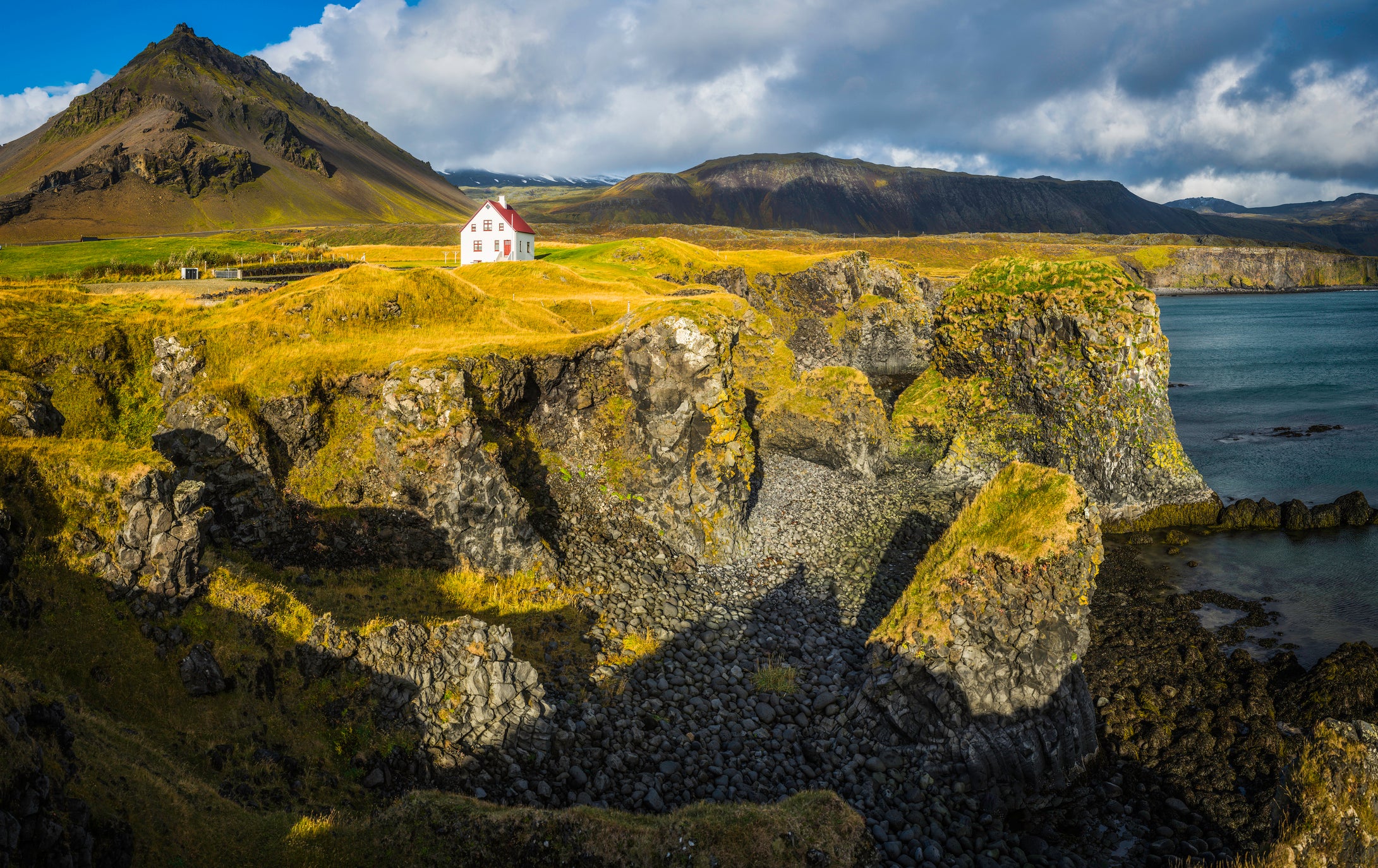 Remote settlement on the dramatic ocean cliffs of the Snaefellsnes peninsula in eastern Iceland.ProPhoto RGB profile for maximum color fidelity and gamut.