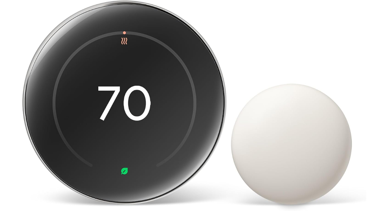 Round smart thermostat displaying 70 degrees with a heating icon, next to a white spherical temperature sensor