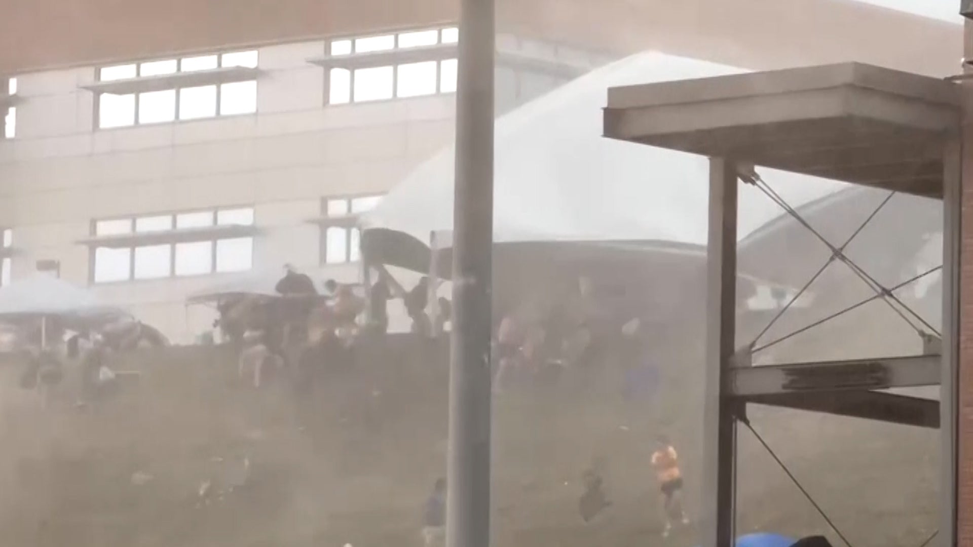 Strong winds hospitalize 5 people at NCAA baseball game