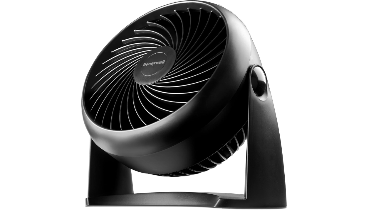Black Honeywell desktop fan with curved blades and adjustable tilting stand