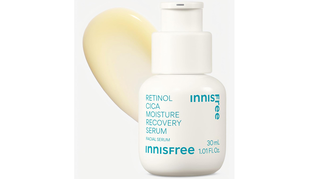 White pump bottle of Innisfree Retinol Cica Moisture Recovery Serum, 30 mL, with a cream-colored product swatch behind it