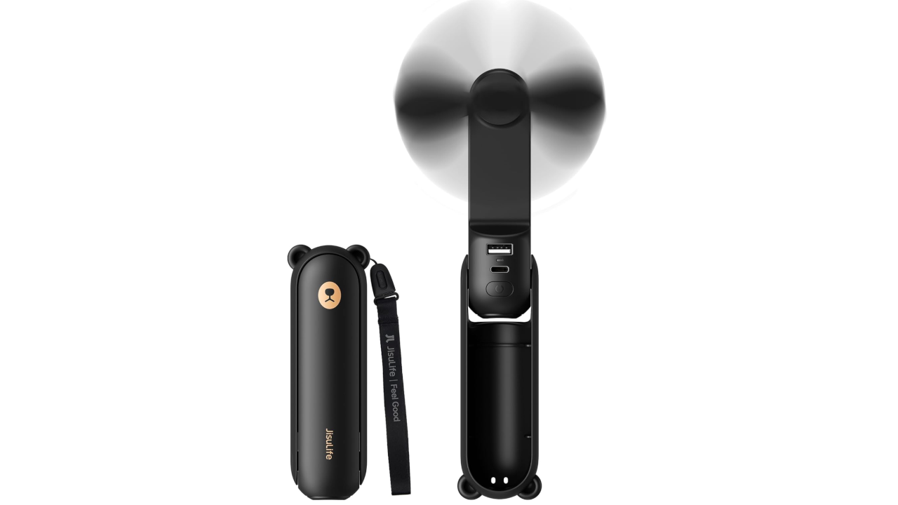 Two black handheld fans, one compact with bear-like design and wrist strap, one larger with spinning blades visible