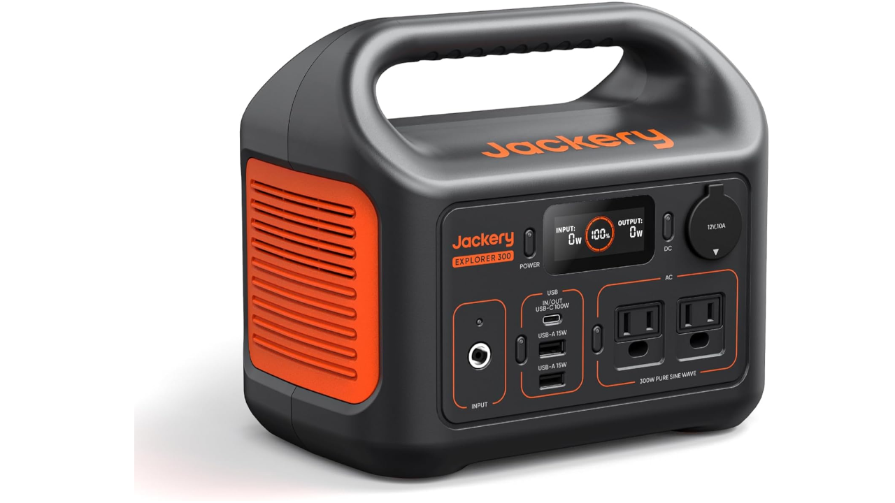 Jackery Explorer 300 portable power station with black and orange design featuring AC outlets, USB ports, LED display, and carrying handle