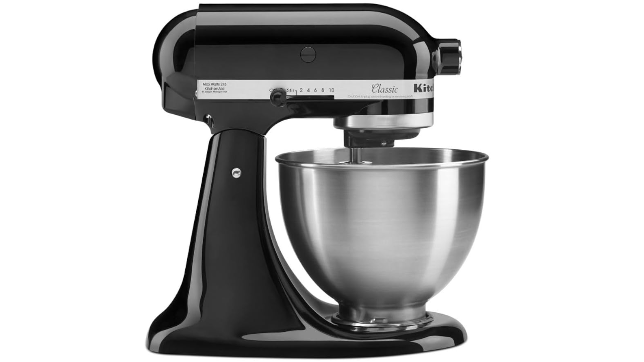 Black KitchenAid Classic stand mixer with stainless steel mixing bowl and speed control dial