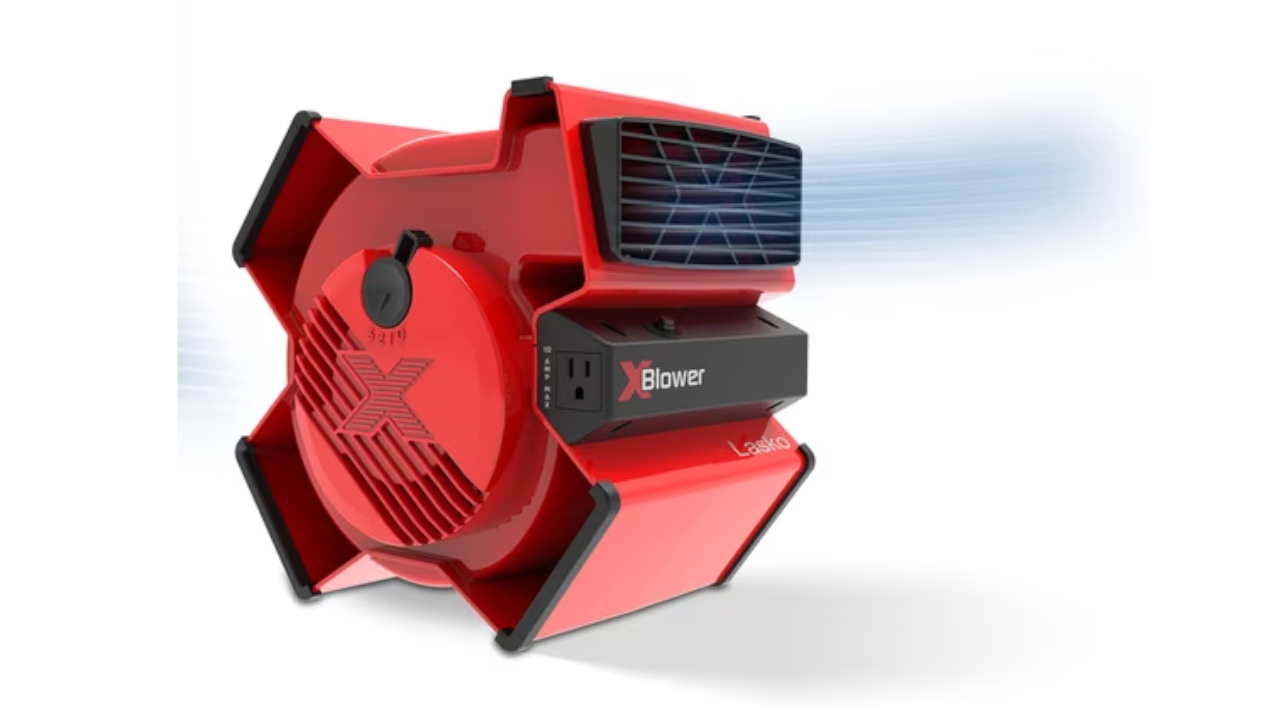 Red XBlower fan with black grille and handle on white background