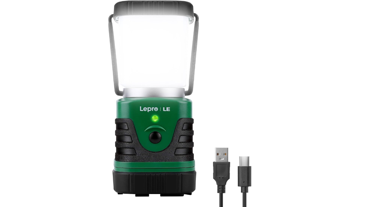 Green and black Lepro LE camping lantern with clear plastic shade and USB charging cable