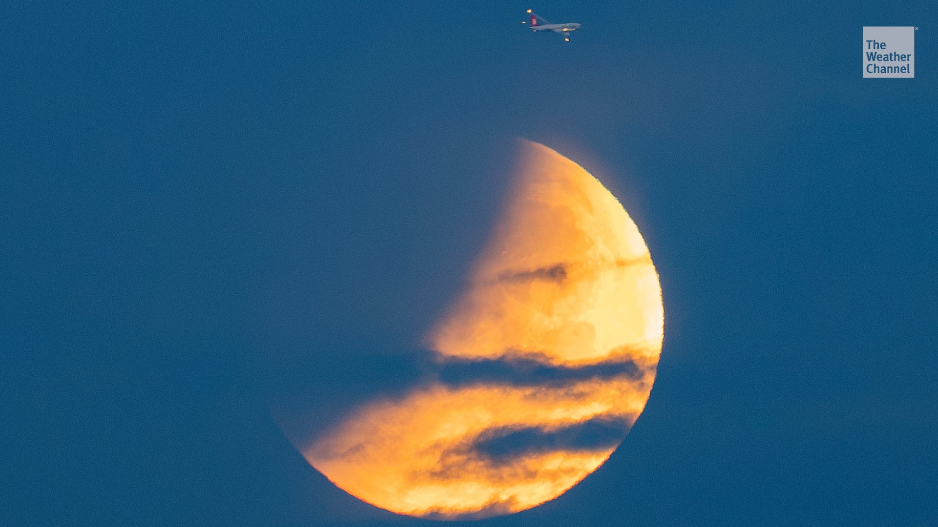 Partial lunar eclipse dazzles U.S. and Europe as 96% of moon darkens