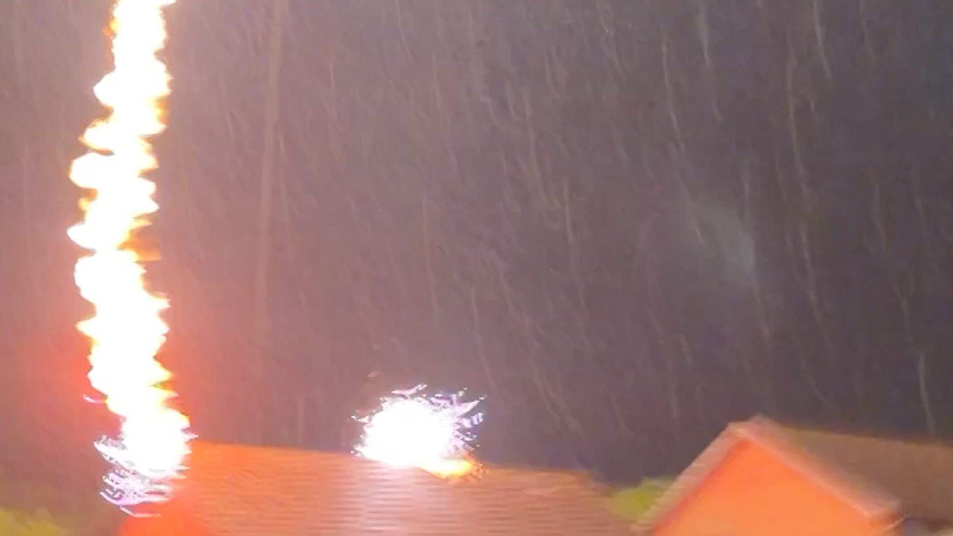 Neighbor films lightning strike that burns down home