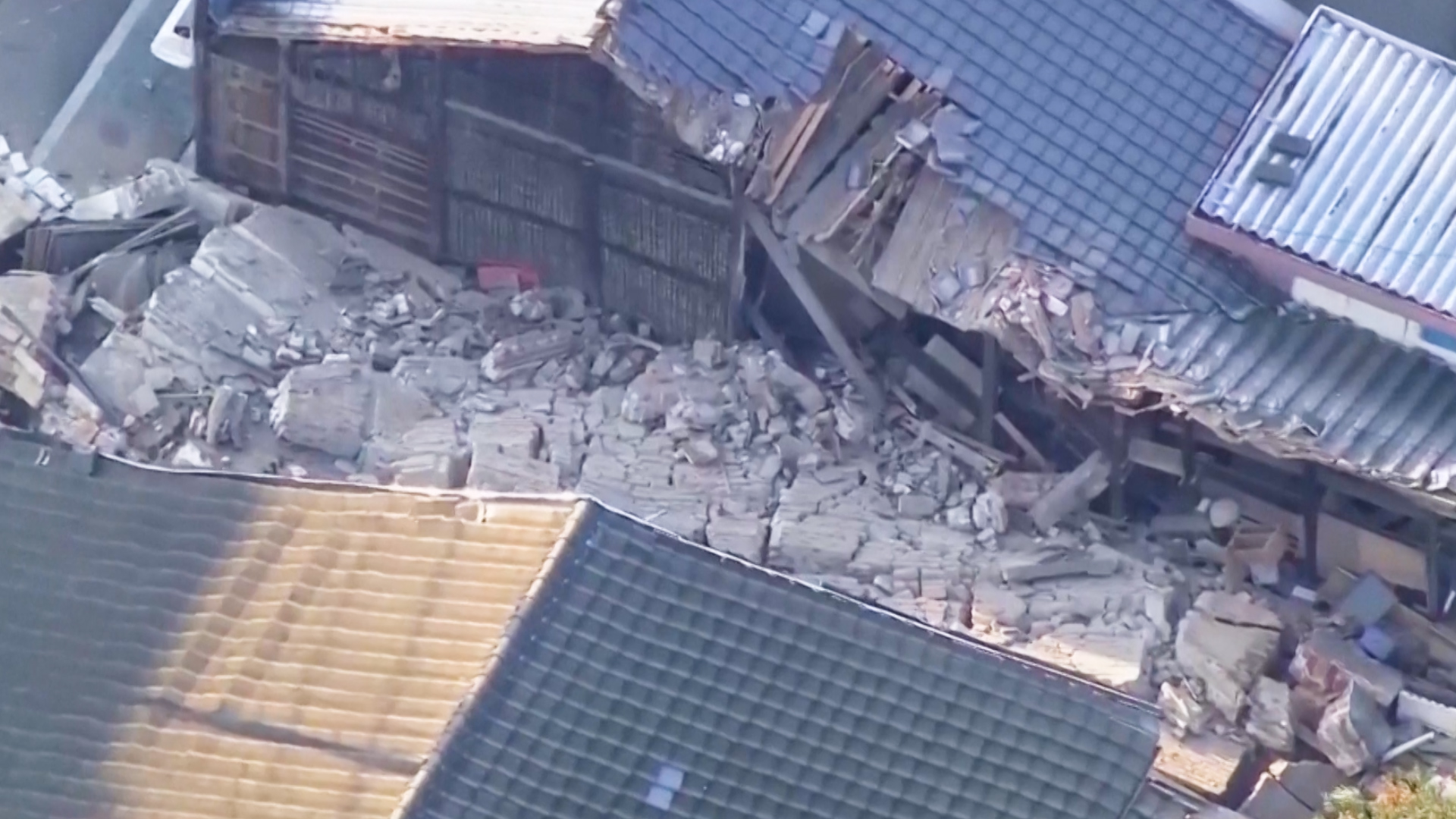 6.8 quake rocks southern Japan, sparks fires and collapses