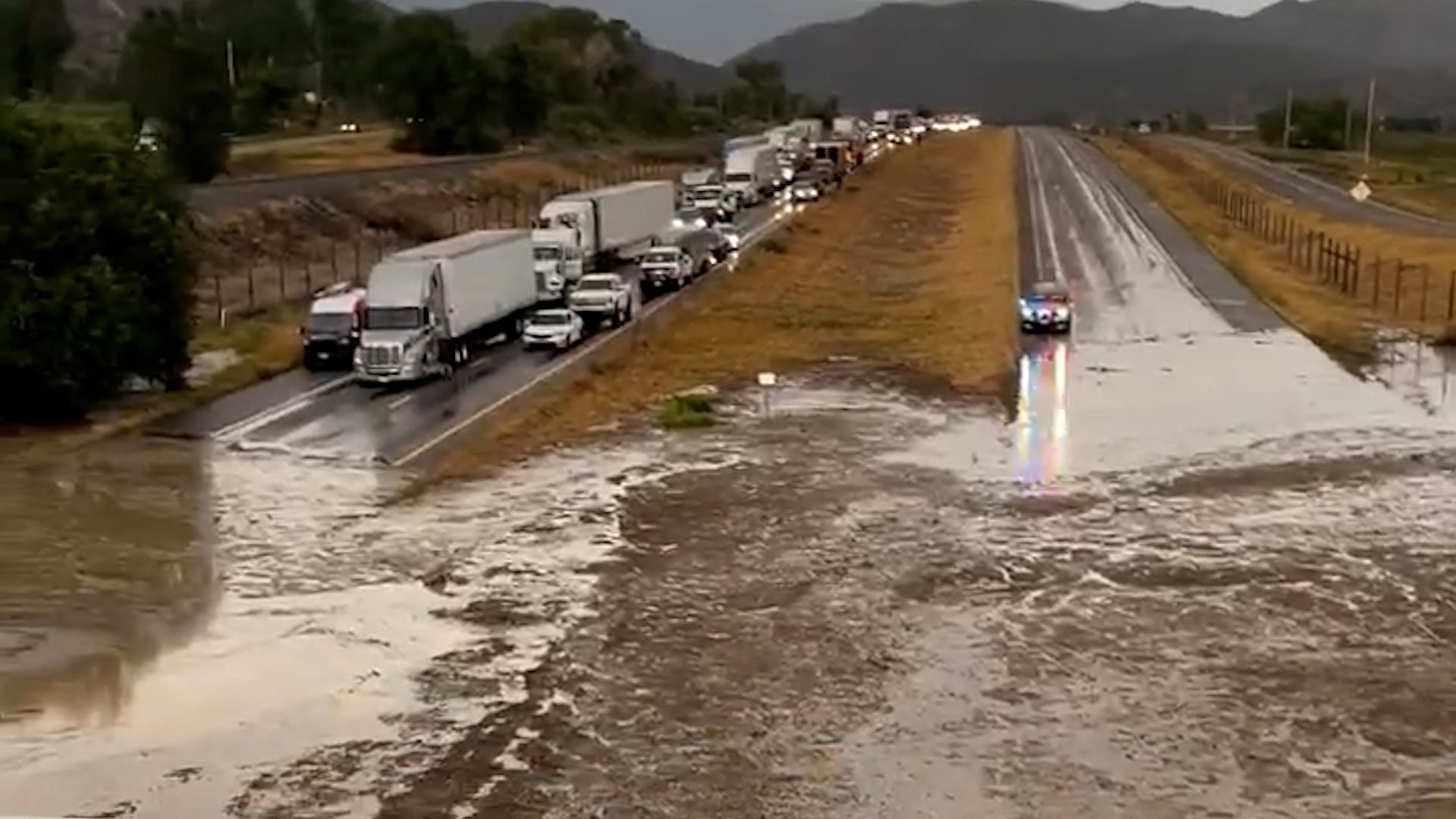 Mudslide shuts down I-70 in Colorado after flash flooding