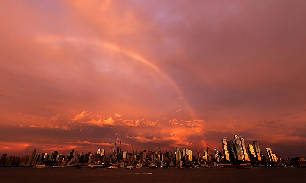 NYC skyline with sunset colors and rainbow