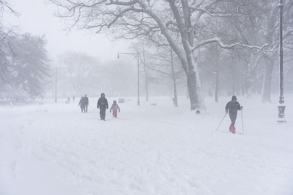 people walk in snow