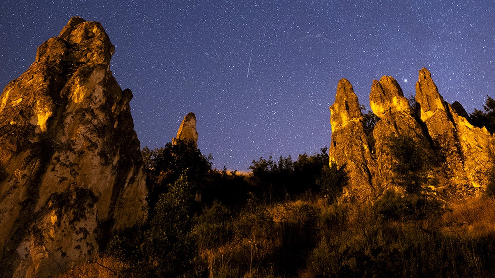 A meteor streaks across a dark sky over Turkey