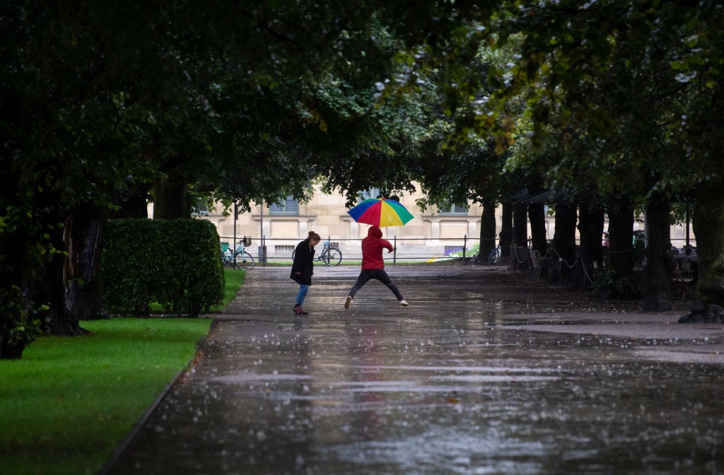 People jumping in rain