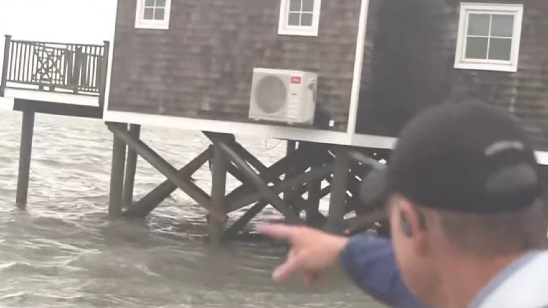 Reynolds Wolf: Nor'easter surge eats away sand beneath home