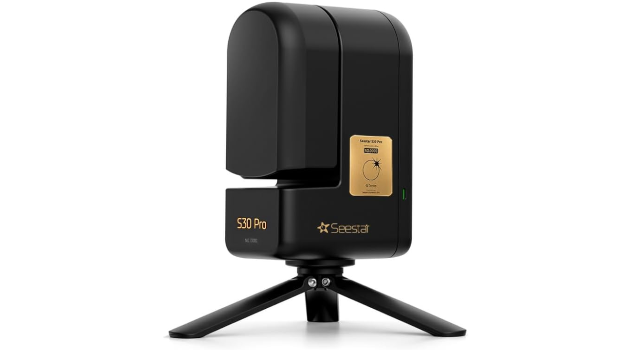 Black Seestar S30 Pro smart telescope on a tripod stand with gold logo badge