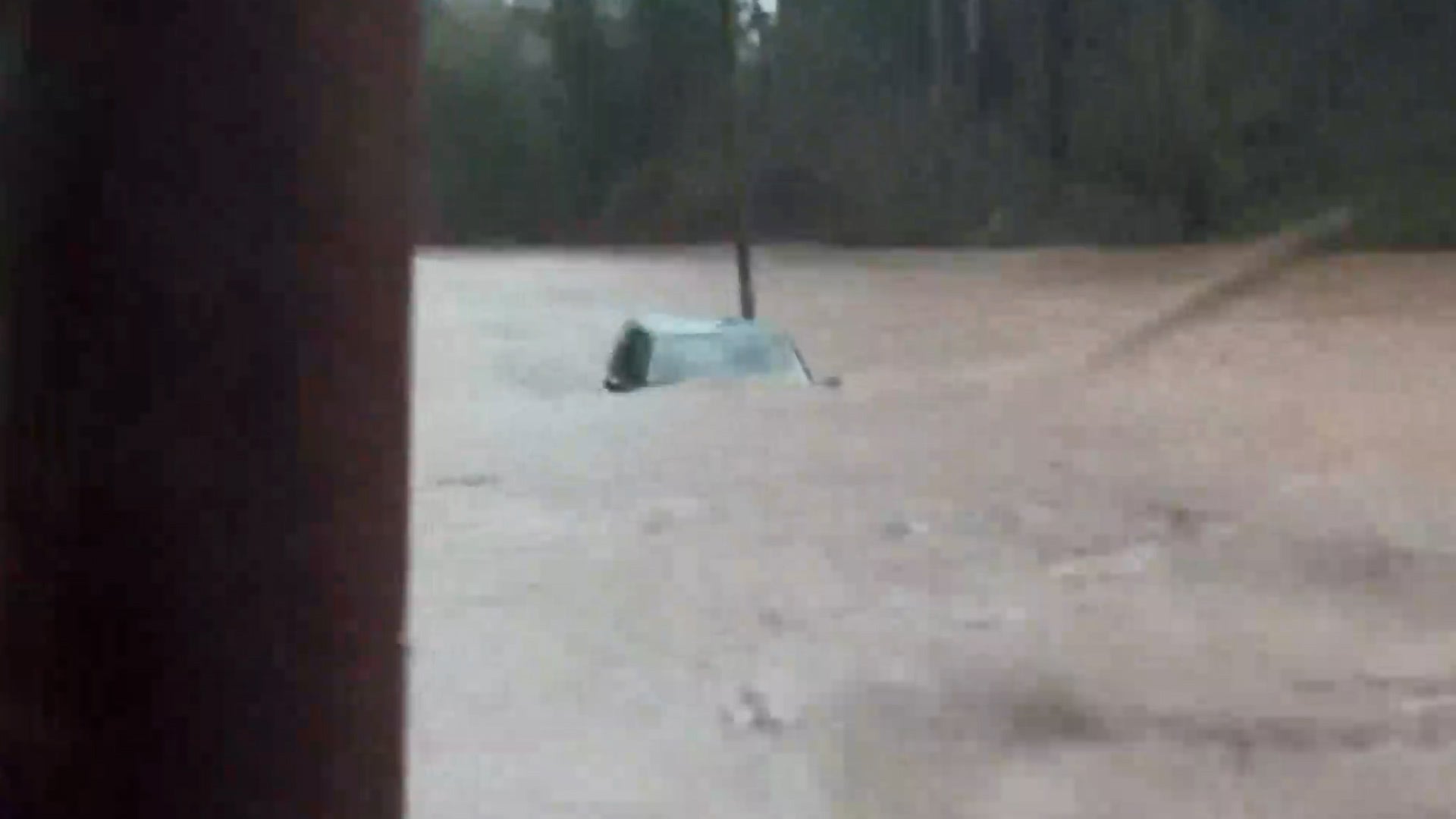 Elderly driver saved seconds before flood swallowed car
