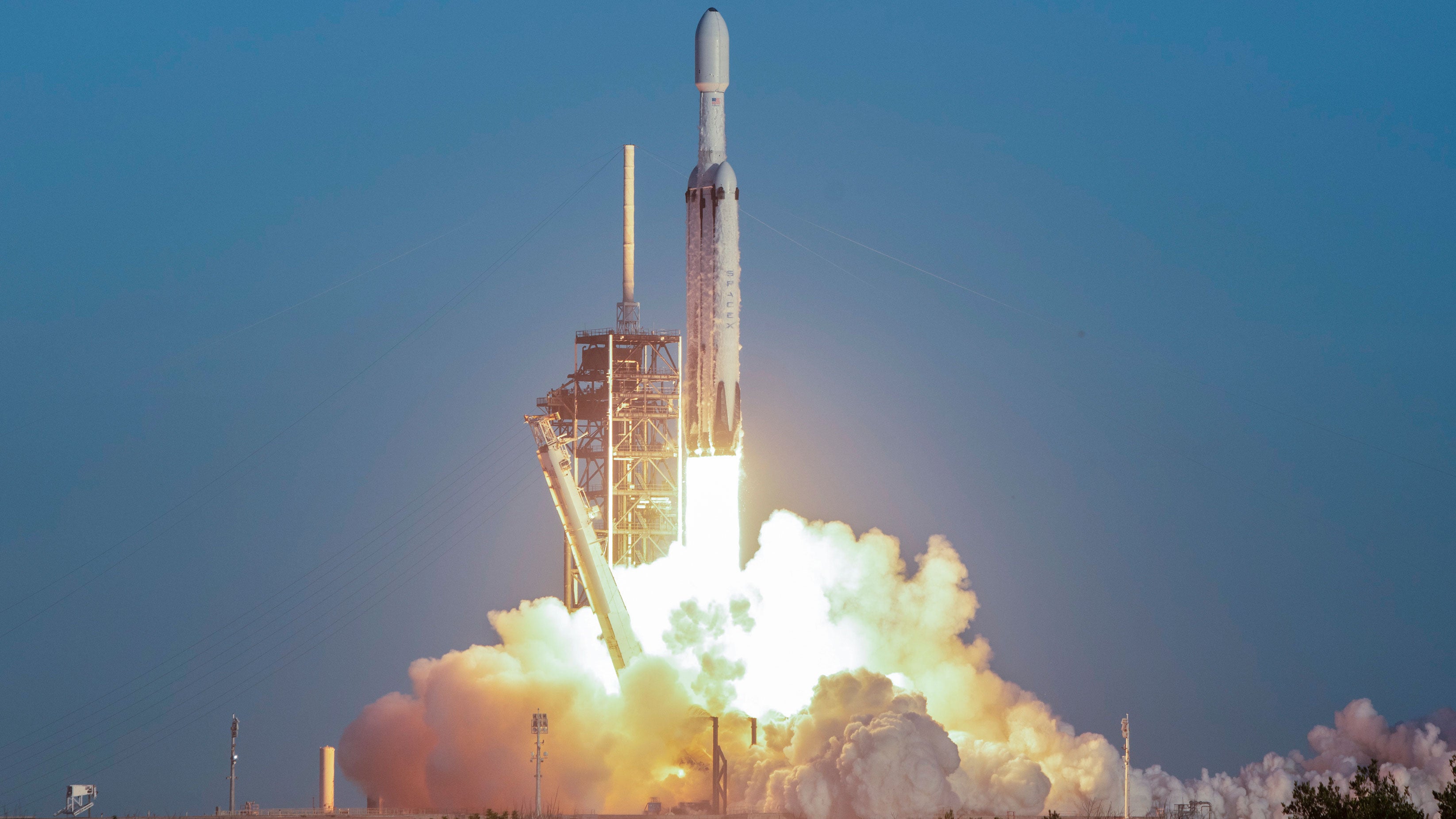 A SpaceX Falcon Heavy rocket launches with NASA'S Nancy Grace Roman Space Telescope onboard from Launch Complex 39A, at NASA's Kennedy Space Center on Aug. 30, 2026, in Cape Canaveral, Florida. Roman will investigate dark energy and dark matter, conduct a statistical census of planetary systems and enable a broad range of additional astrophysics research.