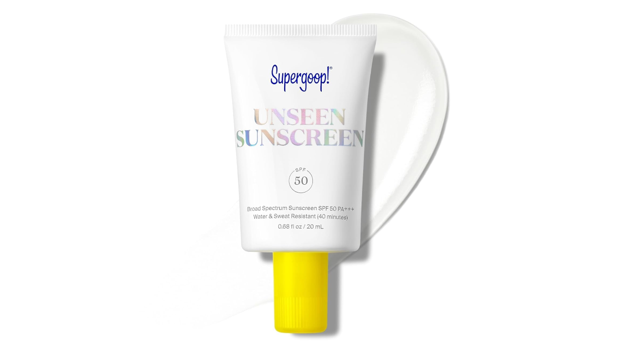 White tube of Supergoop! Unseen Sunscreen SPF 50 with yellow cap and product squeezed out beside it