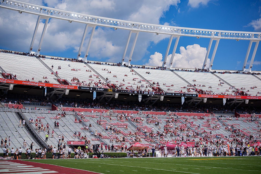 nearly empty stands at football game