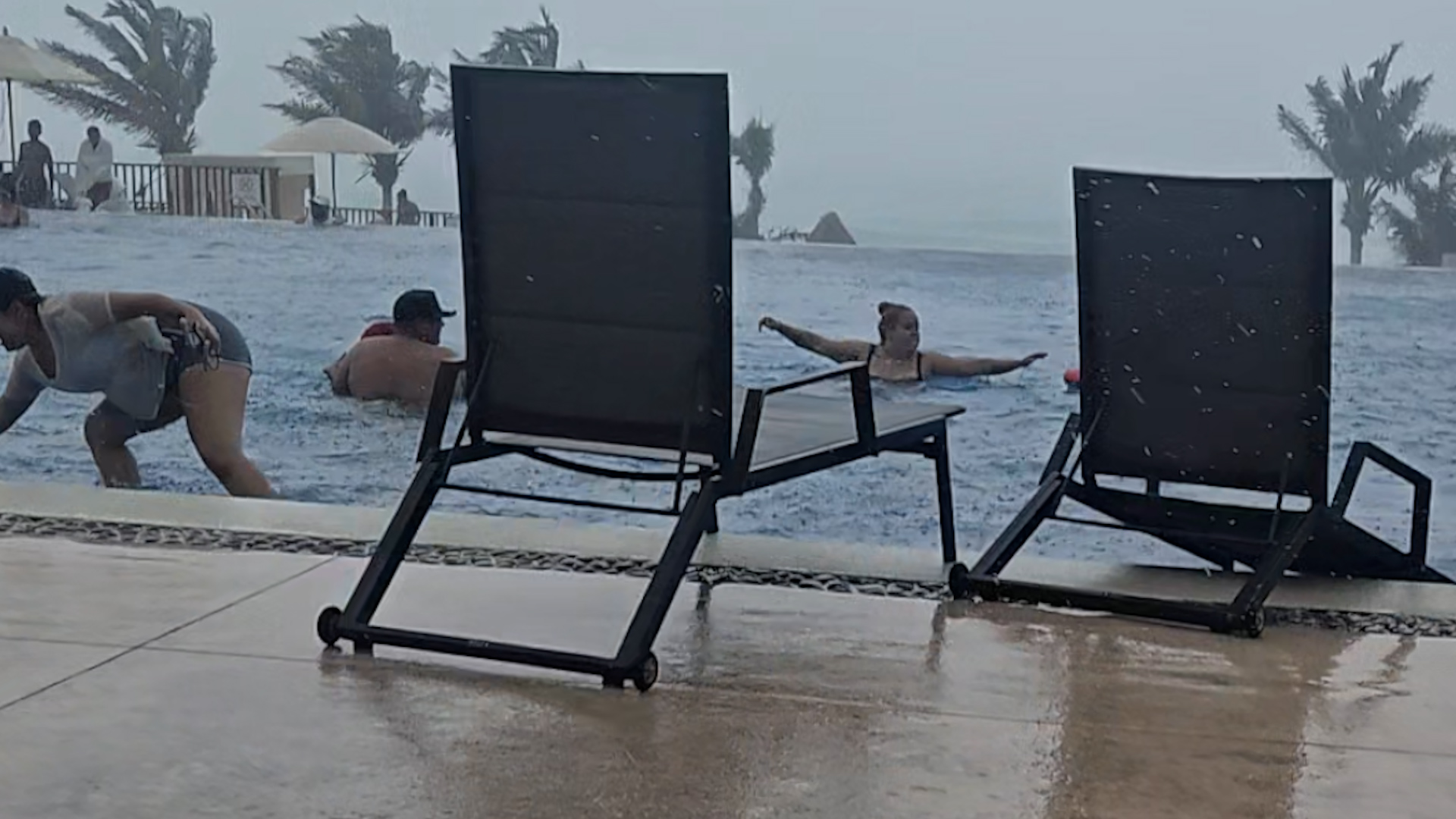 Storm sends lounge chairs swimming in Cancun