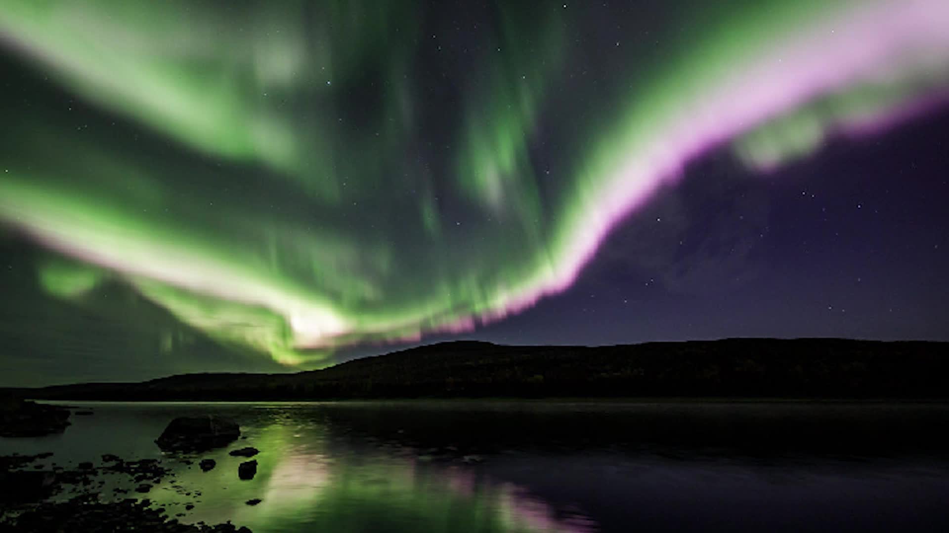 Aurora Shines Pretty in Pink Over Norway