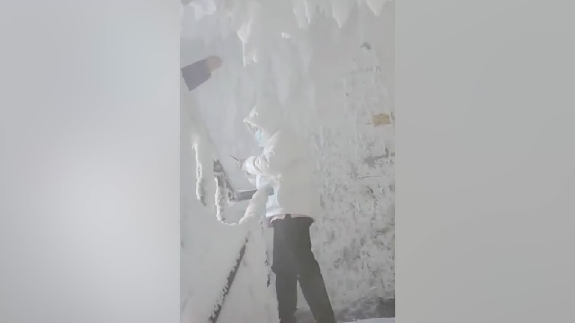 Chinese Apartment Building Fills With Ice After Door Is Left Open