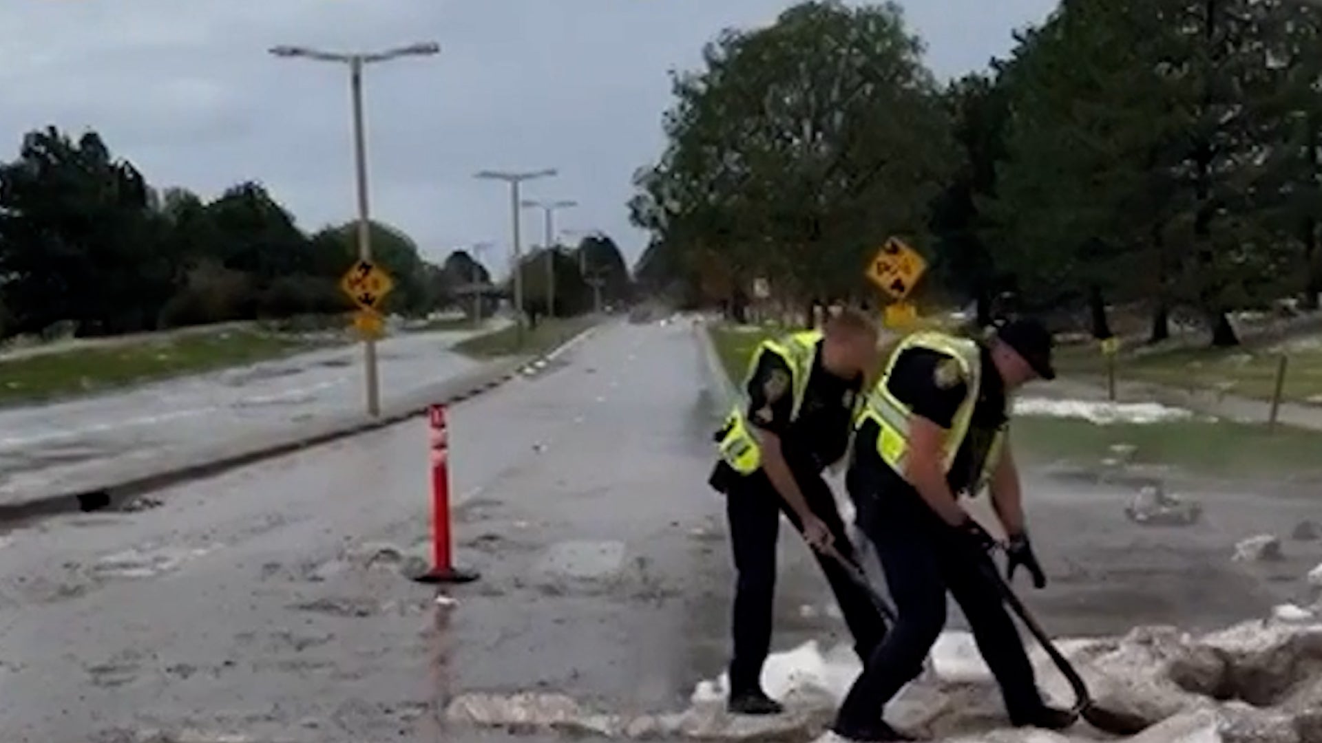 Cops shovel huge mounds of hail from Colorado streets after severe storms