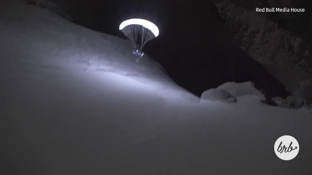 Daredevil Speedrides Across a Glacier at Night