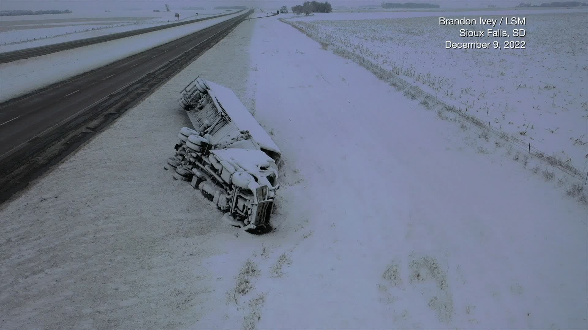 Eerie Scene Of Semi Flipped Along Snowy Highway