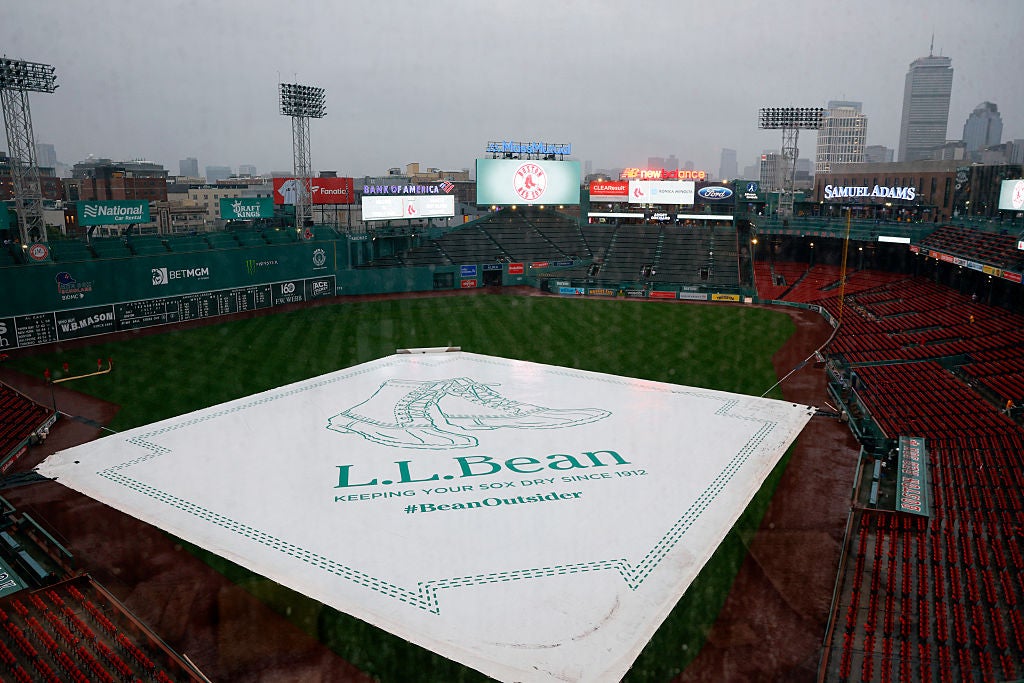 Rain falls over Fenway Park in Boston during a game postponement.