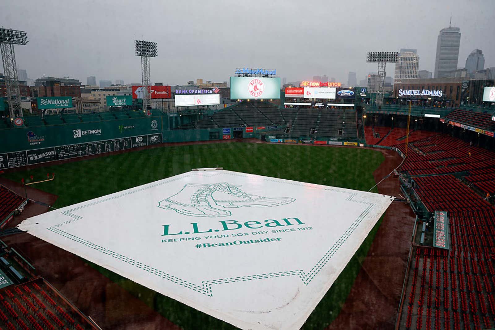 Rain falls over Fenway Park in Boston during a game postponement.