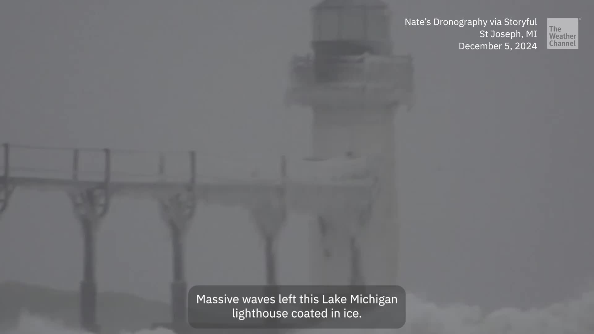 Freezing Waves Coat Lighthouse In Ice