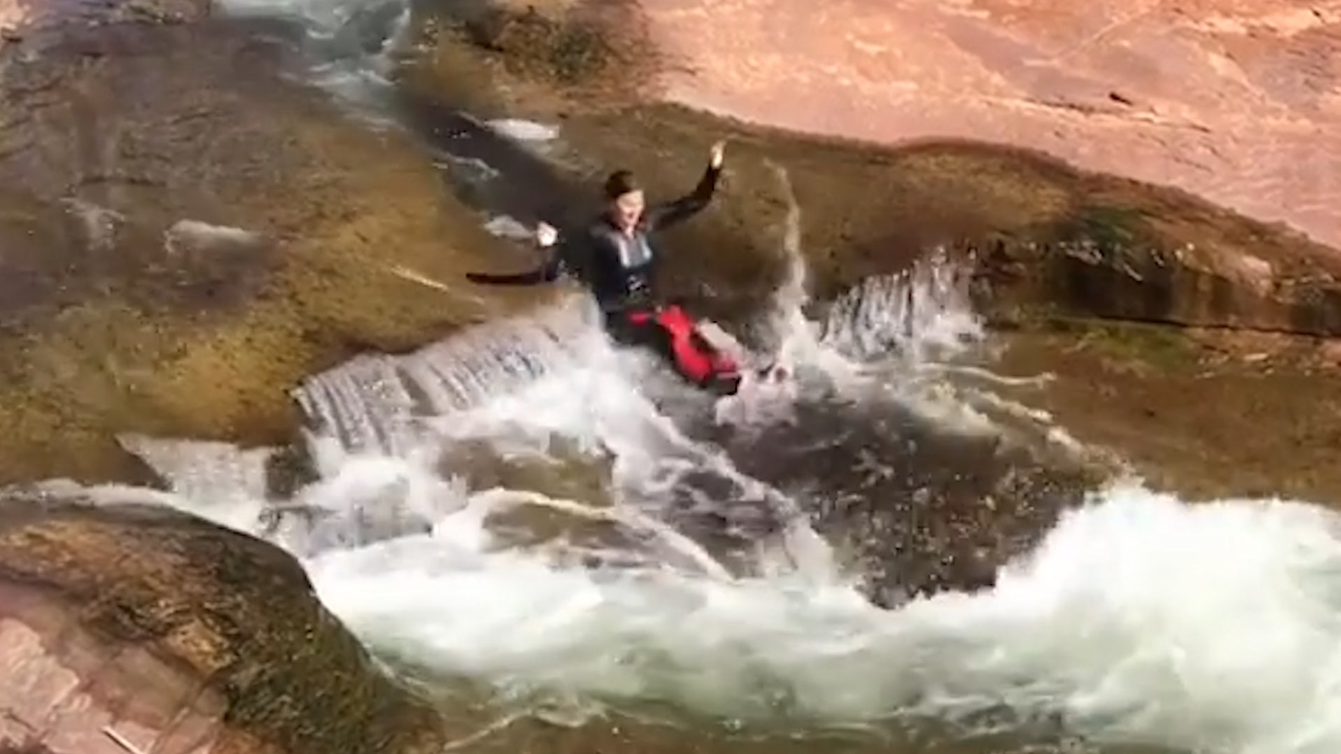 Going Down a Natural Rock Waterslide