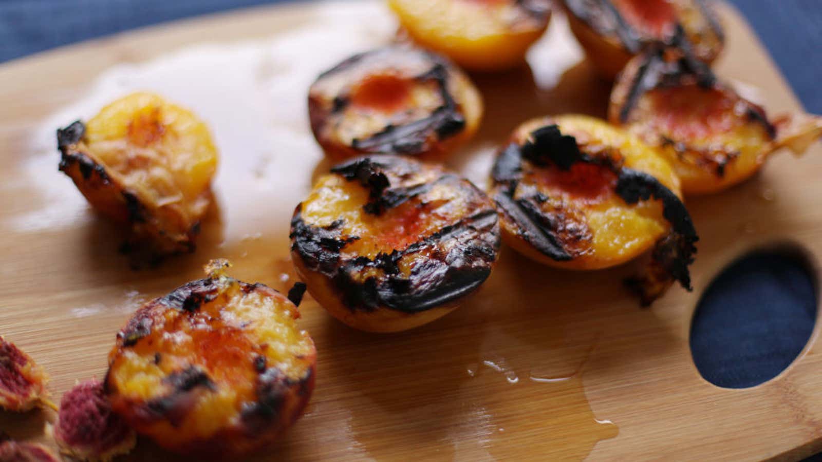 Grilled peach and burrata salad with prosciutto and basil