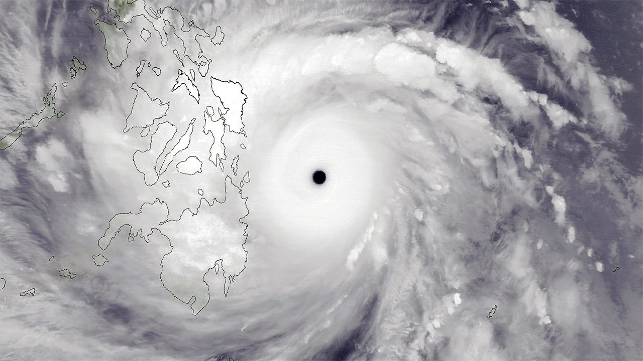 Satellite view of a powerful hurricane with a clear eye near the Philippines