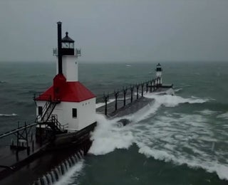 Huge Waves, Icicles Cover Michigan Lighthouse Pier