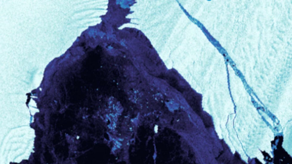 Iceberg Breaks Free From Glacier