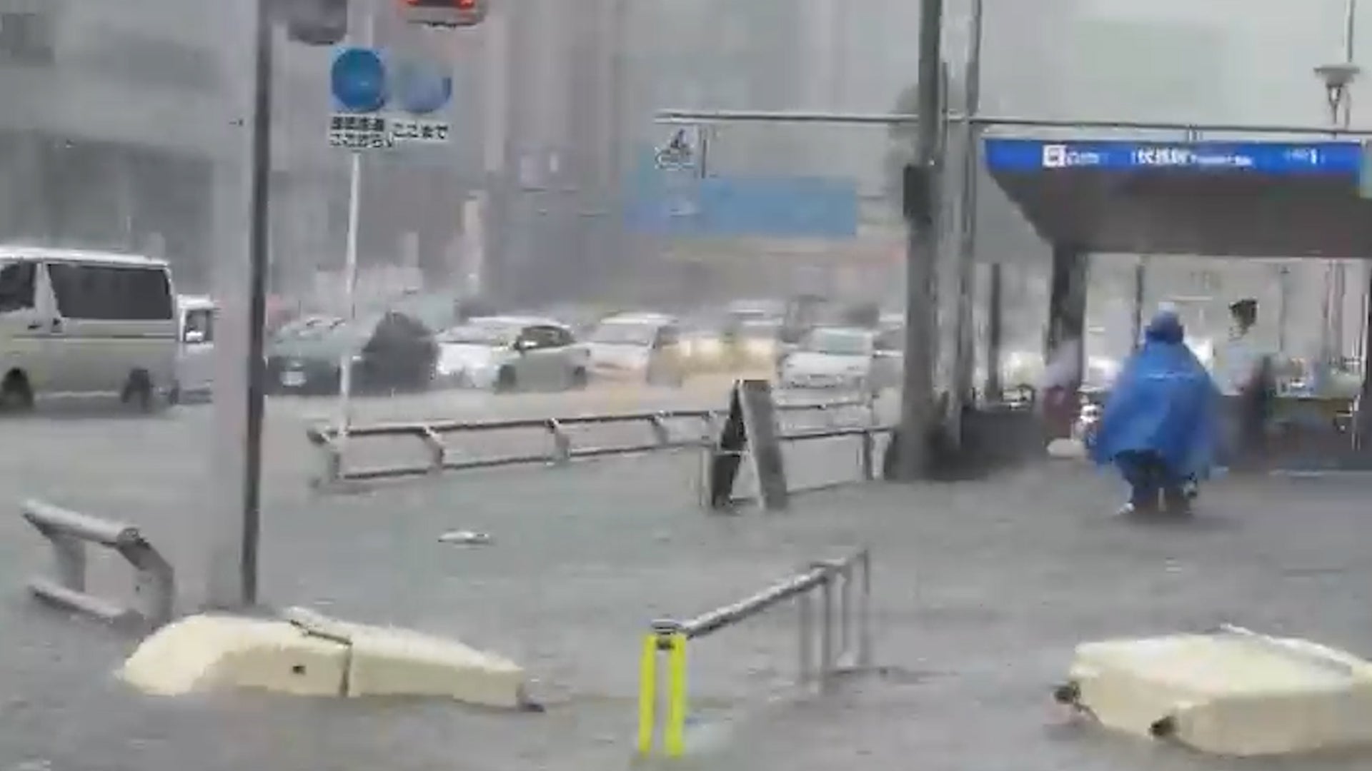 Torrential rain in Japan overwhelms sewers, trains