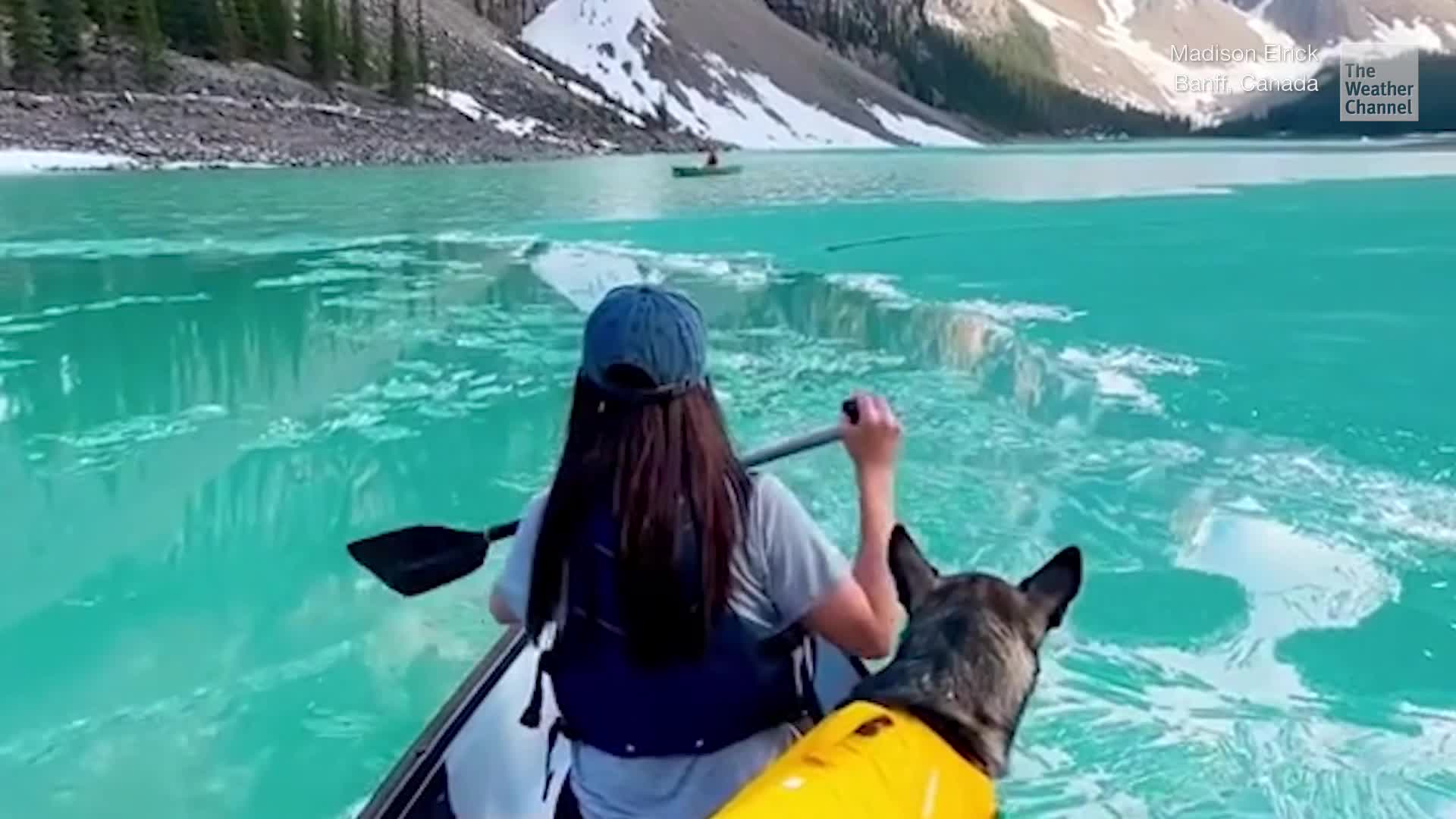 Kayaker Encounters Beautiful Candle Ice On Crystal Blue Lake