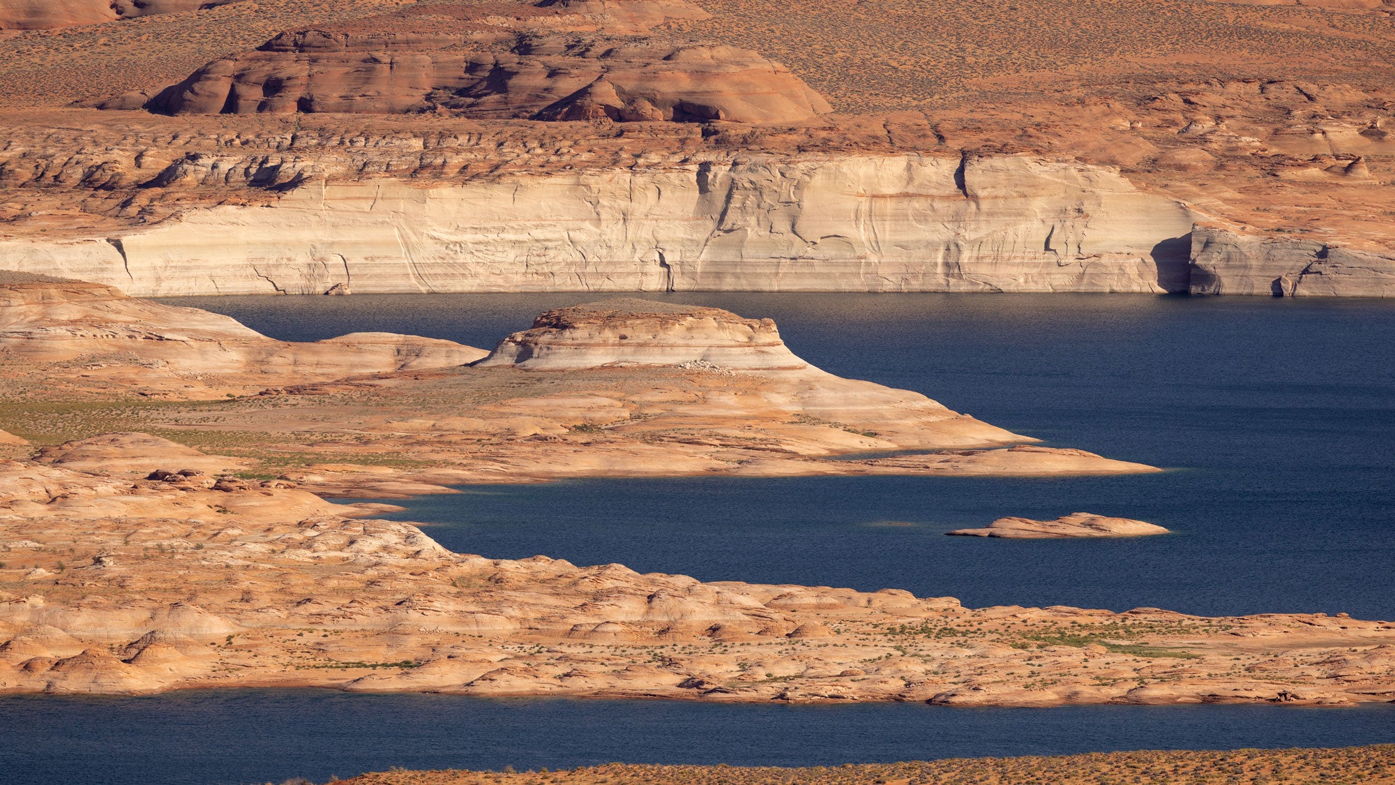 Land and geologic formations that have been underwater since the 1960s, when Lake Powell was created, reemerge for the first time while record-low water levels continue to drop on Sept. 3, 2026 near Page, Arizona. 