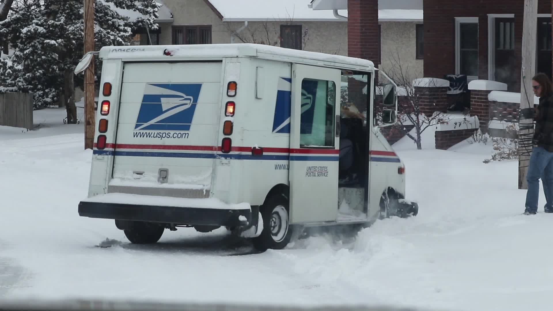 Mail Truck Stuck Spinning in Snow