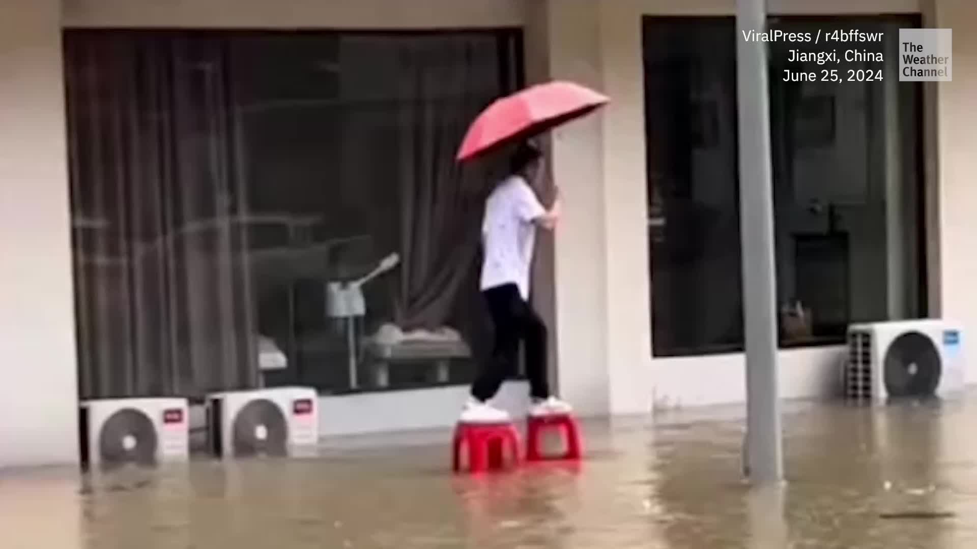 Man&rsquo;s Attempt To Cross Flooded Street Comes Up Short And Wet