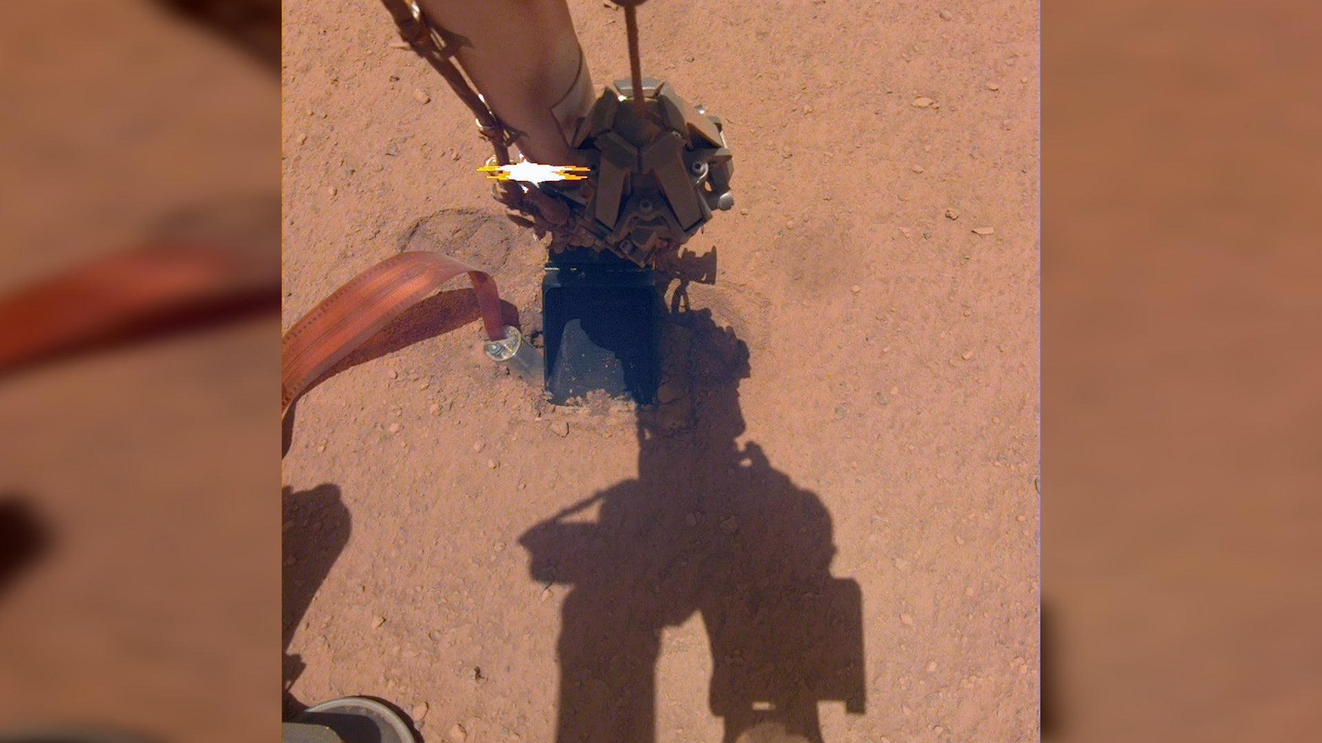 Mars Lander's Probe Spat Out by Red Planet