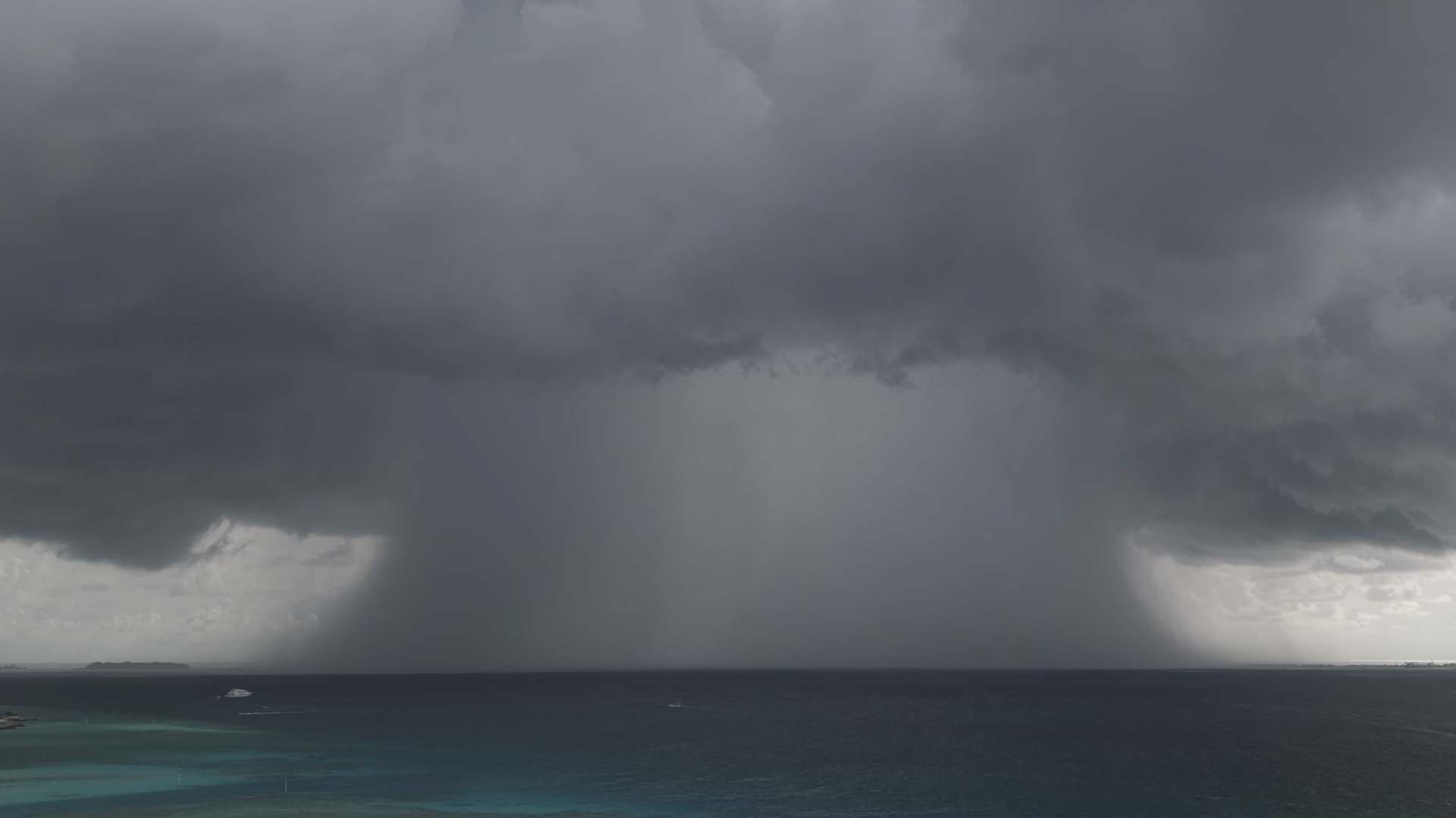 Stunning Storm Creates Pillar Of Rain Over The Ocean