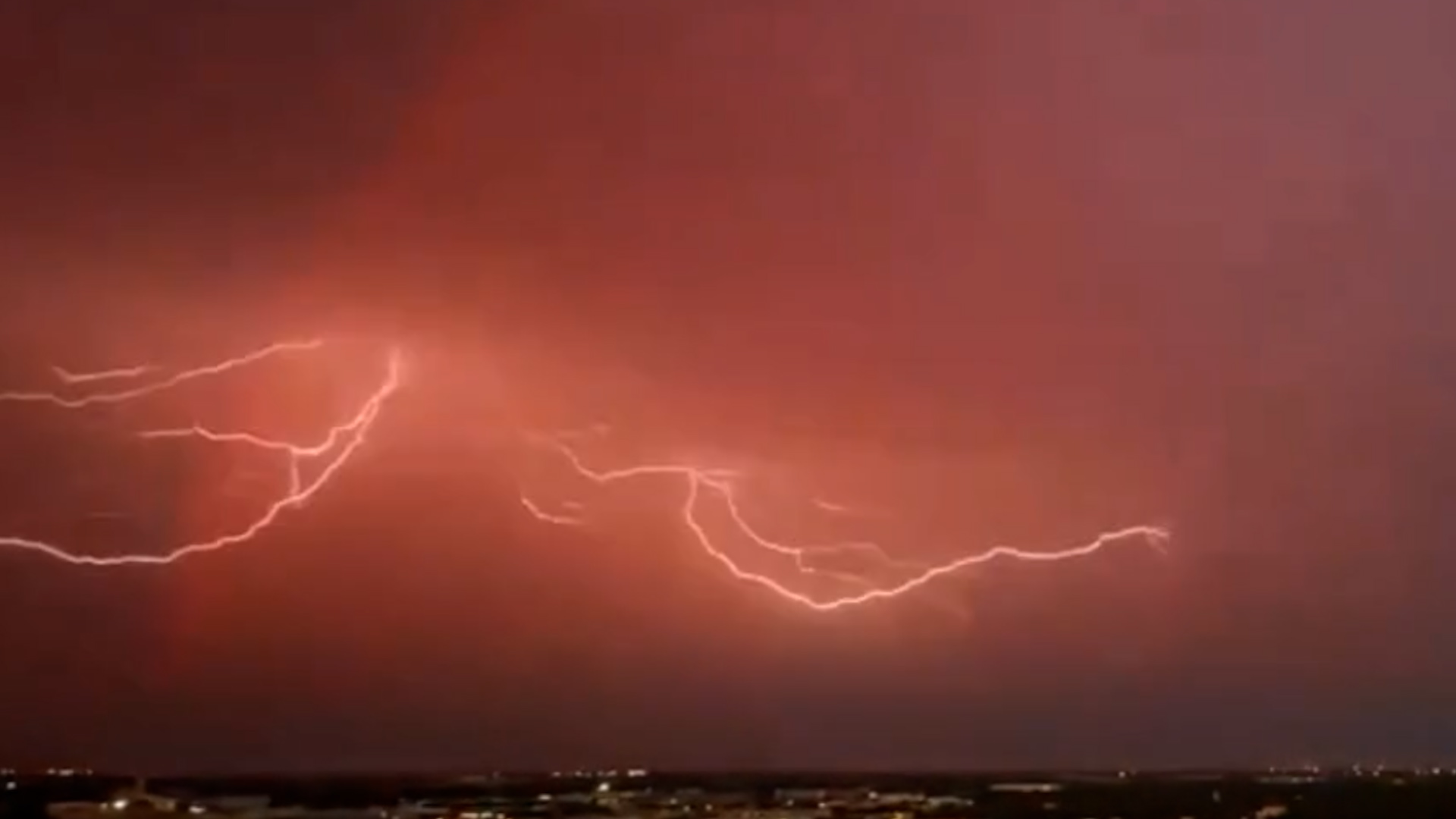A Texas Weather Trifecta: Lightning + Rainbow + Sunset
