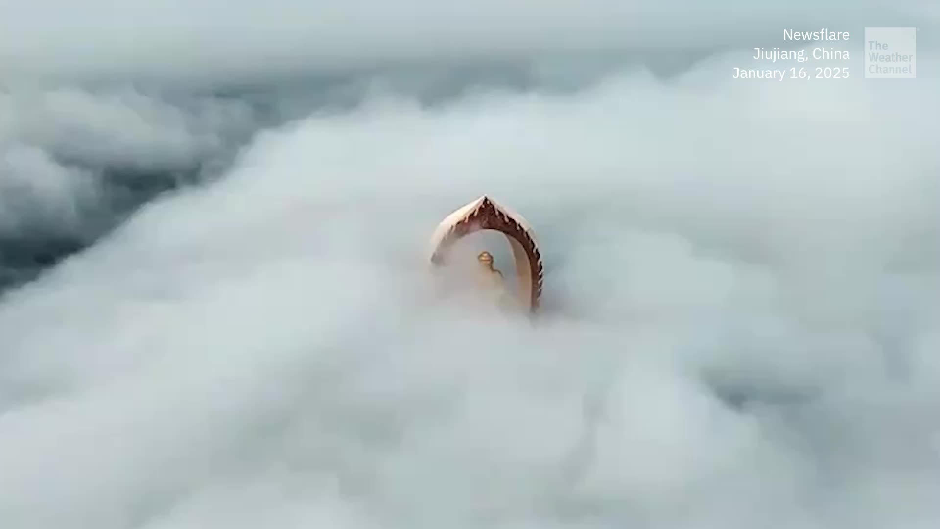 Mystical Statue Emerges From &lsquo;Cloud Waterfalls&rsquo;