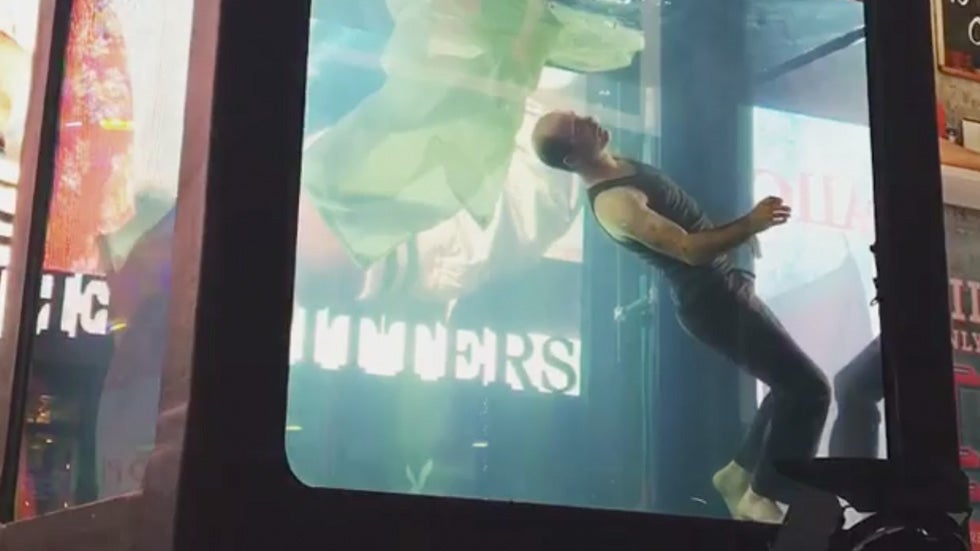 Performers 'Drown' In Times Square