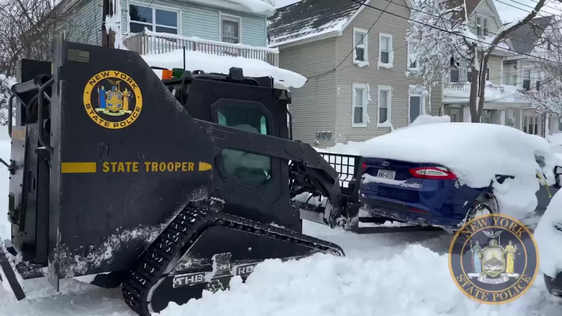 Police Use Heavy Machinery To Move Cars In Buffalo, New York